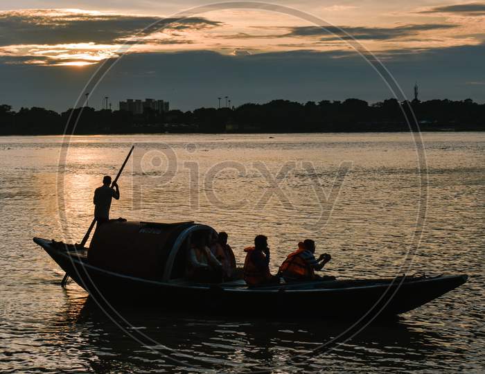 A Boat in the middle of the Ganga River at evening time
