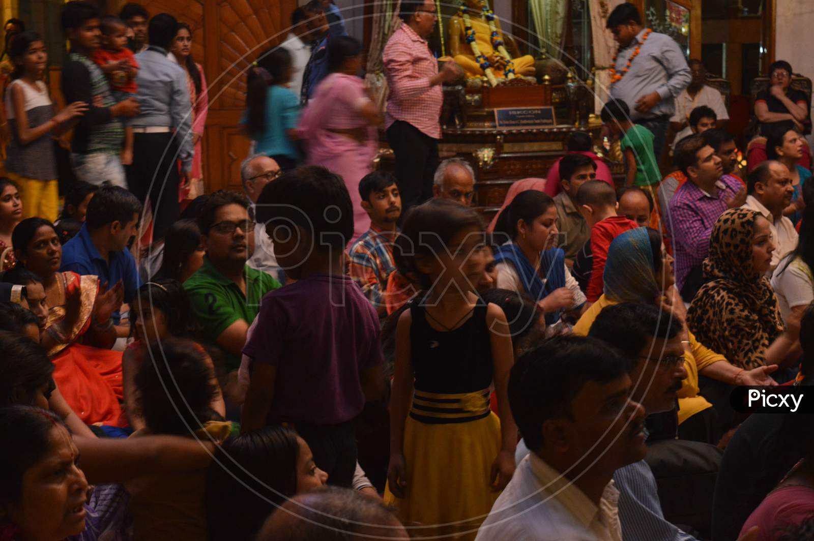 On The Indian Festival Of Lord Krishna Birth Ceremony( Janmastami) People Are Dancing, Enjoying, Celebrating, Raising Hand At Night At Iskcon Temple New Delhi, India.