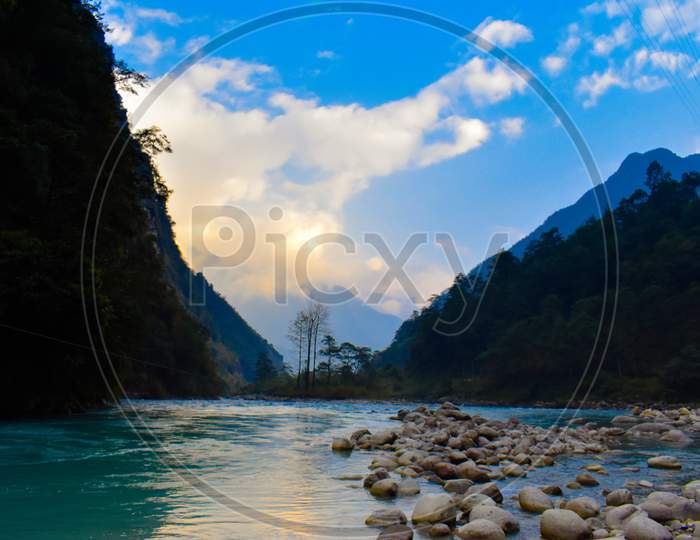 landscape of Flowing Lachung river and mountain in north Sikkim