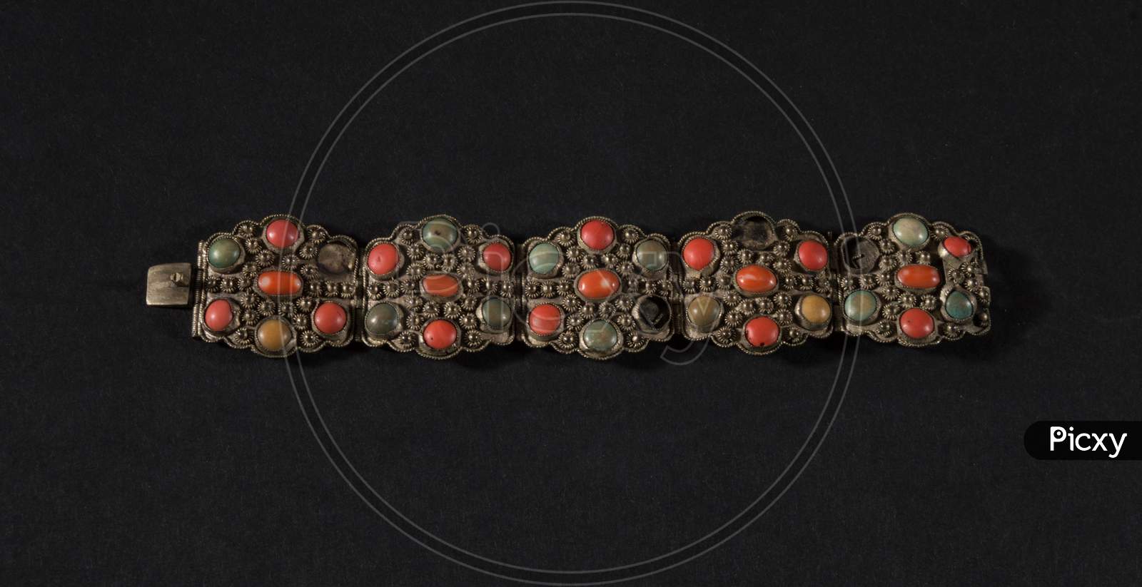 A Beautiful Antique Indian Bracelet Isolated On Black Background With Diamond And Stone