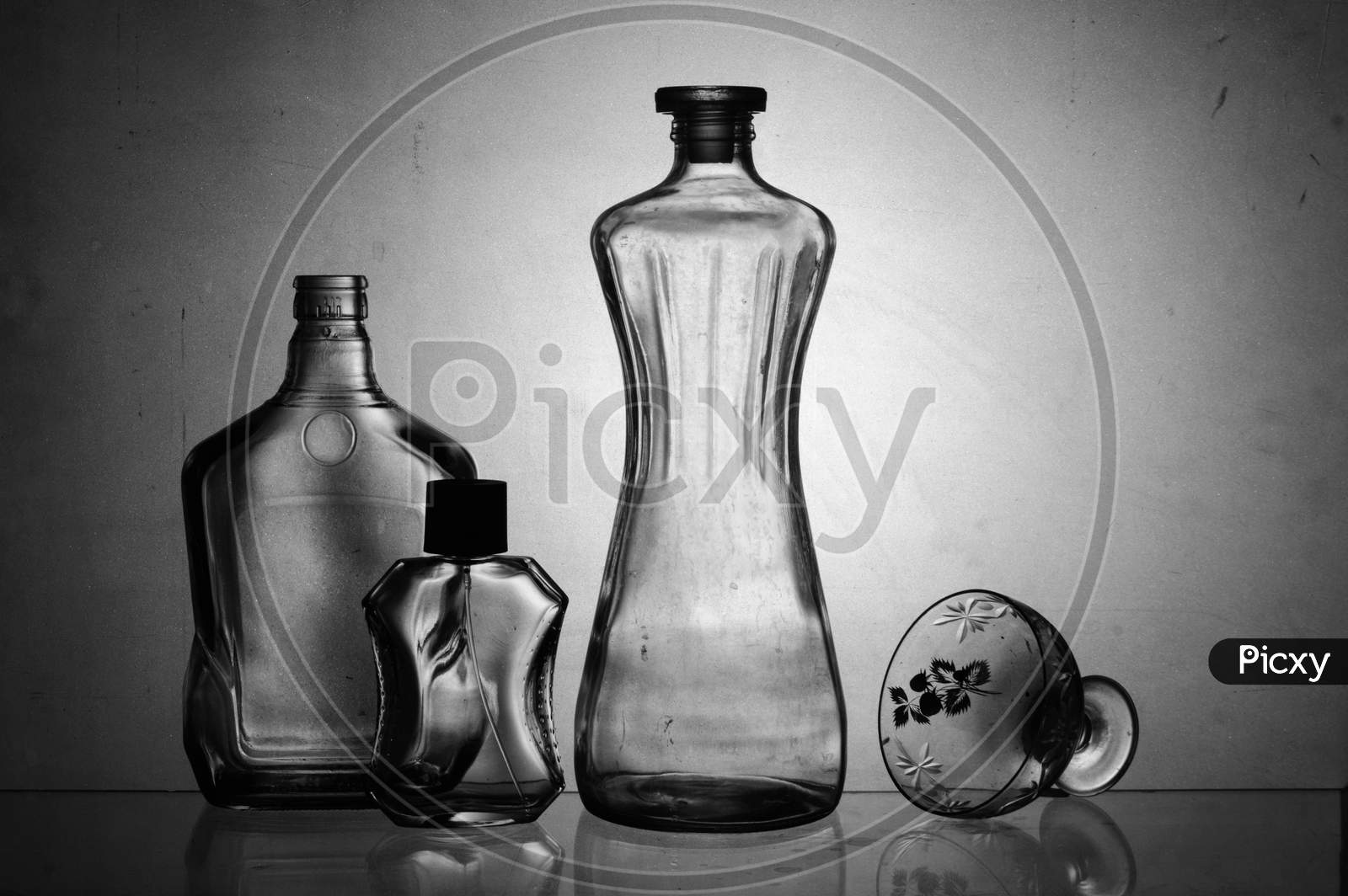 Transparent Glass Product Shoot With White Background At Studio Using Back Light Black & White