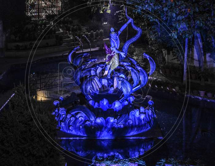 Lord Krishna Doing Dance On The Snake With Blue Light On Iskcon Temple New Delhi India