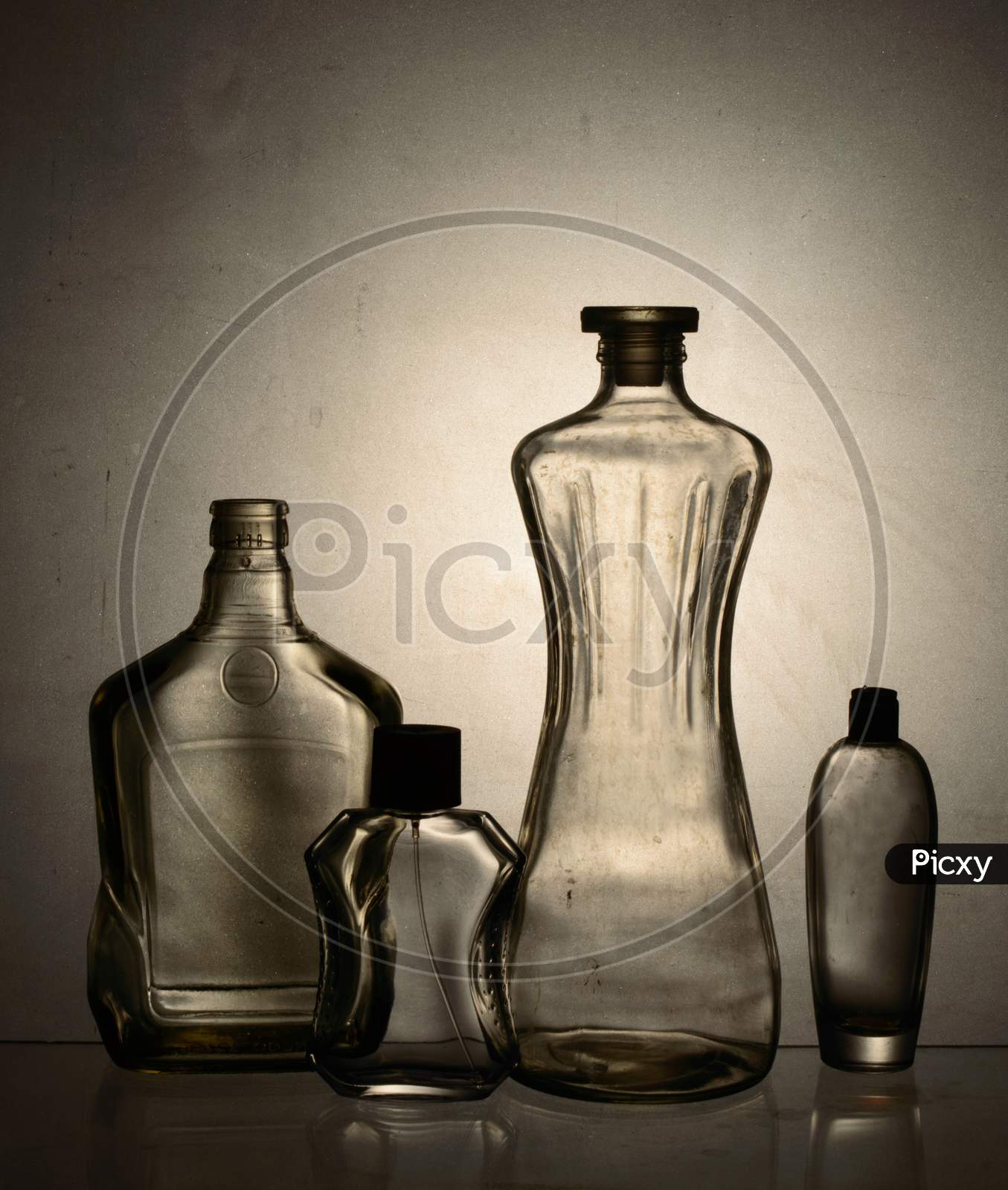 Transparent Glass Product Shoot With White Background At Studio Using Back Light