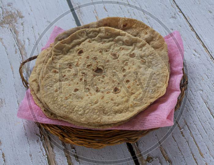 Heap Of Chapatis On A Wicker Tray