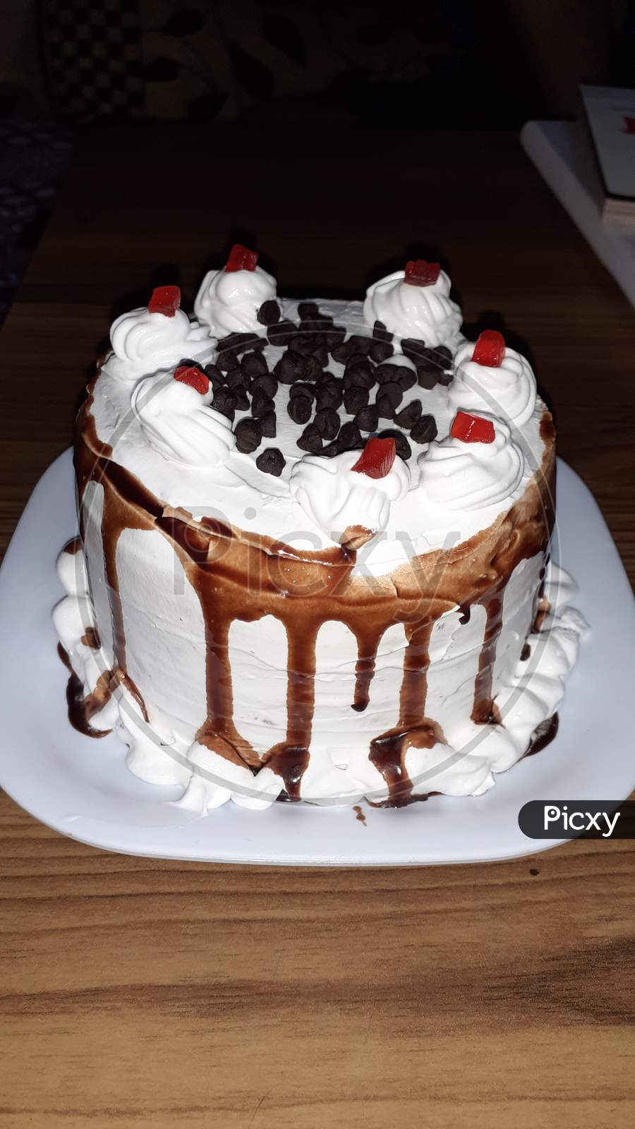 Image of home made ice cake with cherry on top-NM107199-Picxy