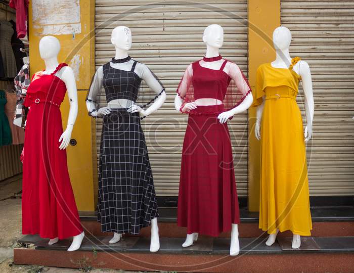 A Pretty picture of a Bewitching Mannequins dressed in Colorful Indian clothing at a street  store in Mysuru cityscape of Karnataka state in India.