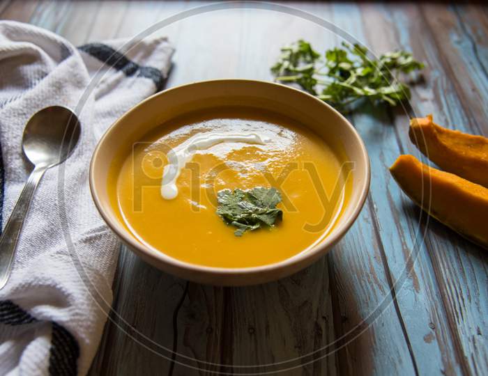Close up of fresh pumpkin soup in a bowl