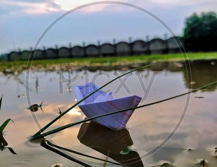 Paper boat with nature