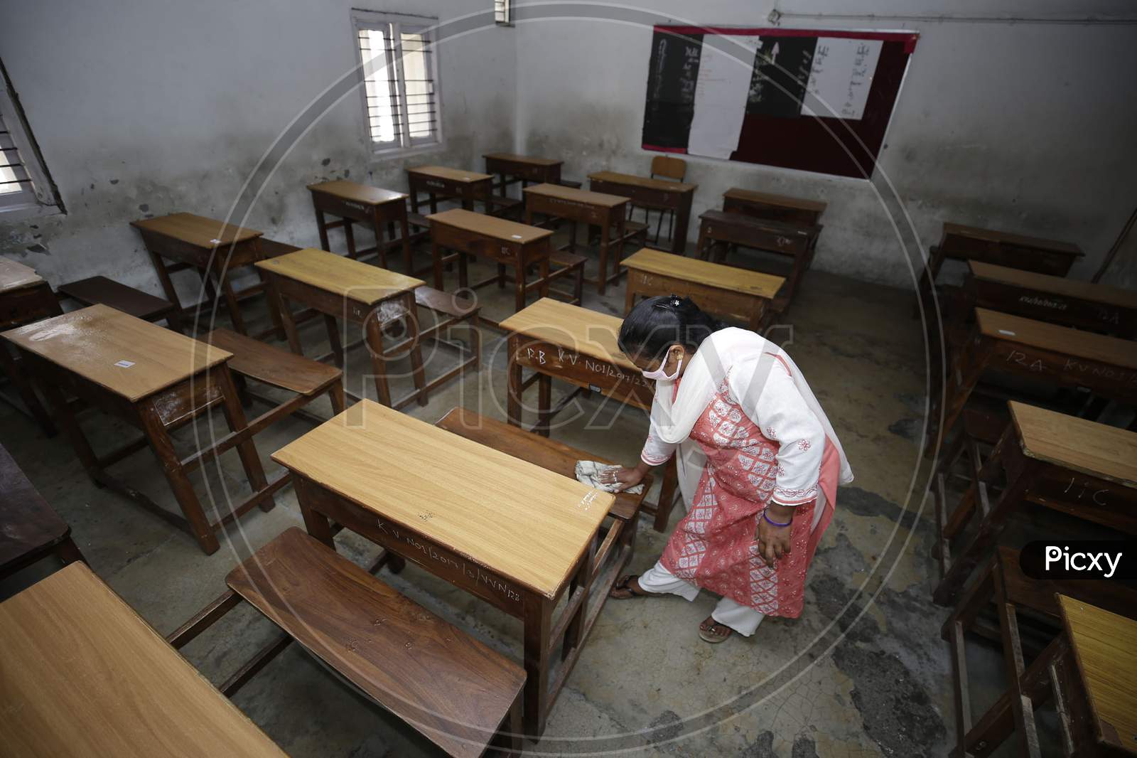 A school building being sanitized in Jammu on Friday as preparations are underway to open the educational institutions for select classes after nearly six months closure due to the outbreak of Coronavirus pandemic on September,18.2020.
