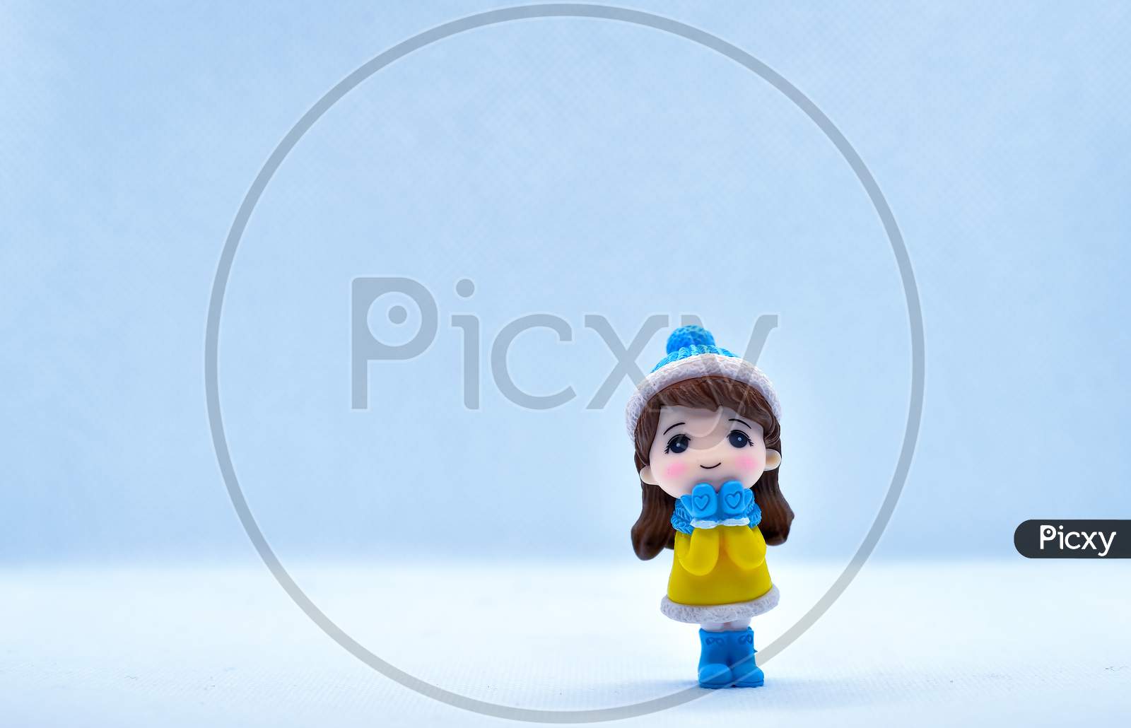 Tourism And Travel Concept: Miniature Little Girl Standing In Isolated Background