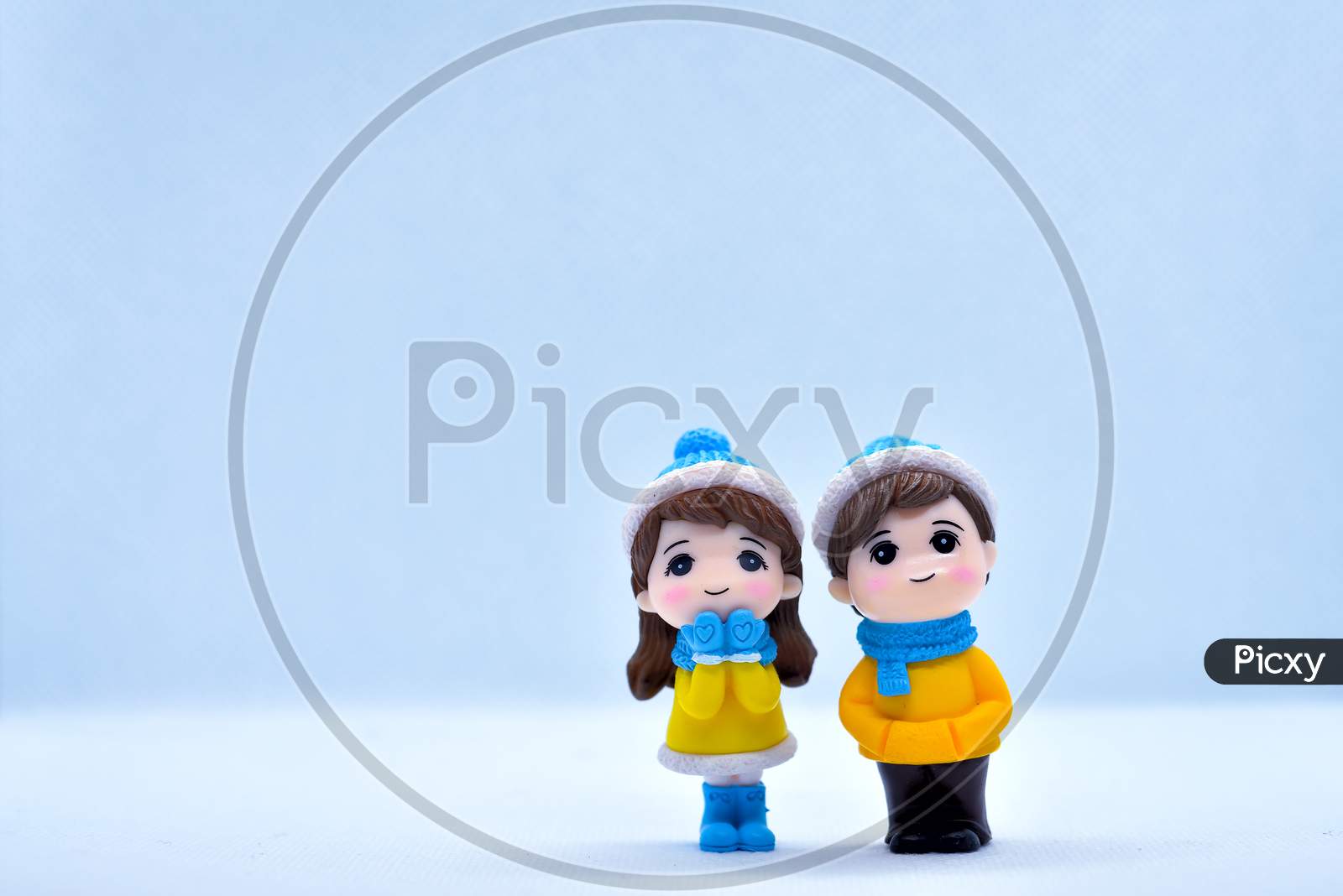 Tourism And Travel Concept: Miniature Little Couple And Girl Standing In Isolated Background