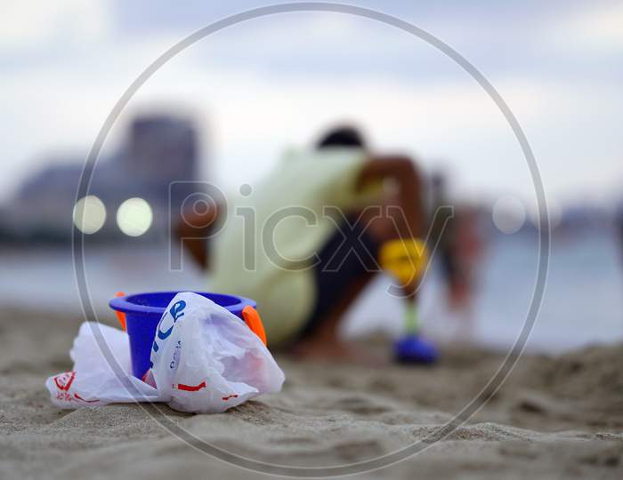 Plastic toys and covers used by kid at a beach