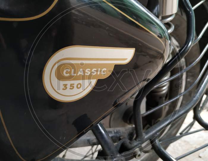 Closeup Of Calligraphic Text Of Royal Enfield In The Bike Petrol Tank