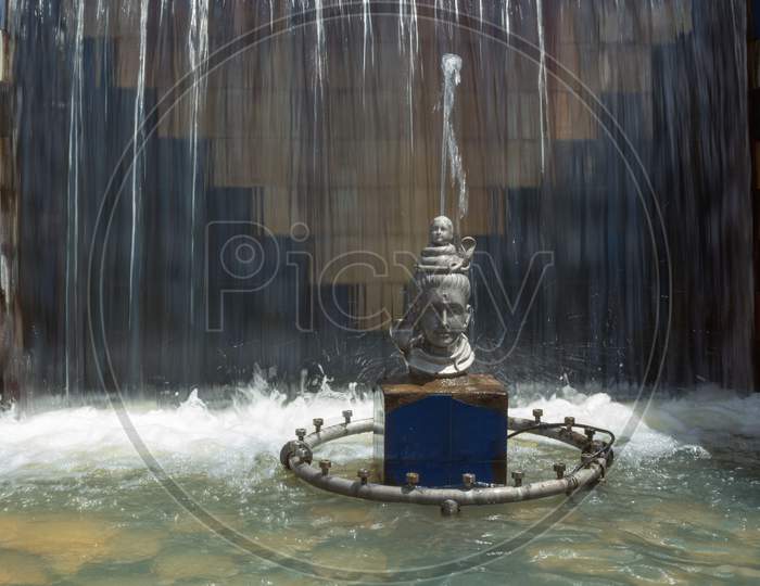An Elegant picture of God Shiva amidst the Flowing water fountain in Brindavan Gardens near Mysore in Karnataka/India.