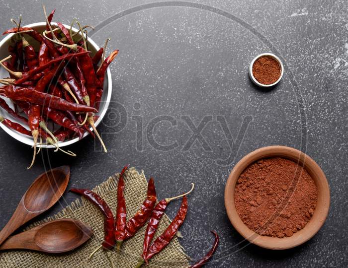 Spicy Red Chilli Powder With Super Chilli Background
