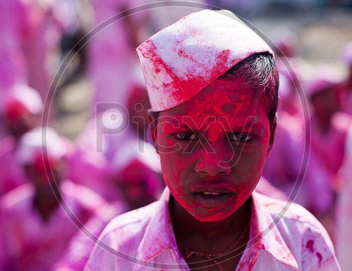 A village boy in colorful face