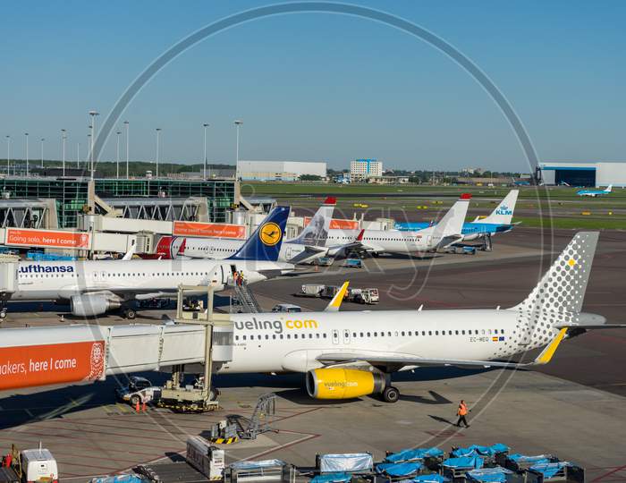 Netherlands, Amsterdam, Schiphol - 06 May, 2018: Vueling Planes At Airport. Schiphol Is One Of The Busiest Airport In Europe.
