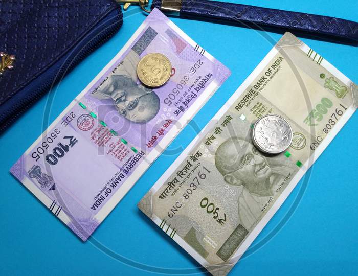 Indian Currency ,100,20 Rupee Notes With Purse ,Blue Background
