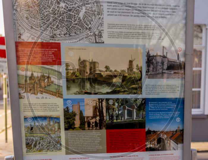 Bruges, Belgium - 17 February 2018: A Flyer Describing The Gentpoort In Brugge/Bruges Belgium