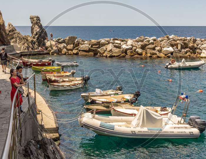 Manarola, Cinque Terre, Italy - 26 June 2018: Boats Docked At The Cove Of Manarola, Cinque Terre, Italy