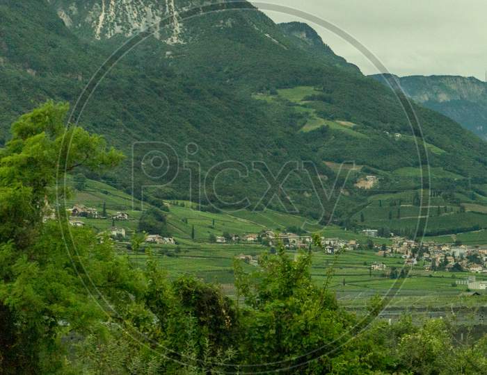 Italy,La Spezia To Kasltelruth Train, A Close Up Of A Lush Green Hillside