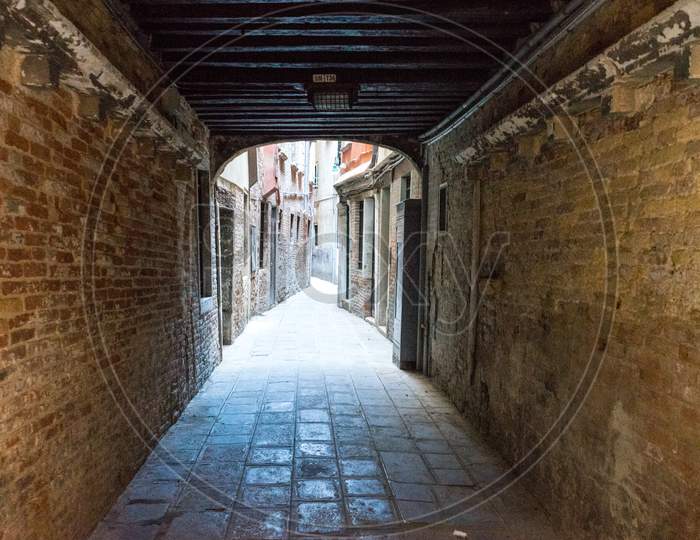 Italy, Venice, Corridor Of Old Building Narrow Street Empty