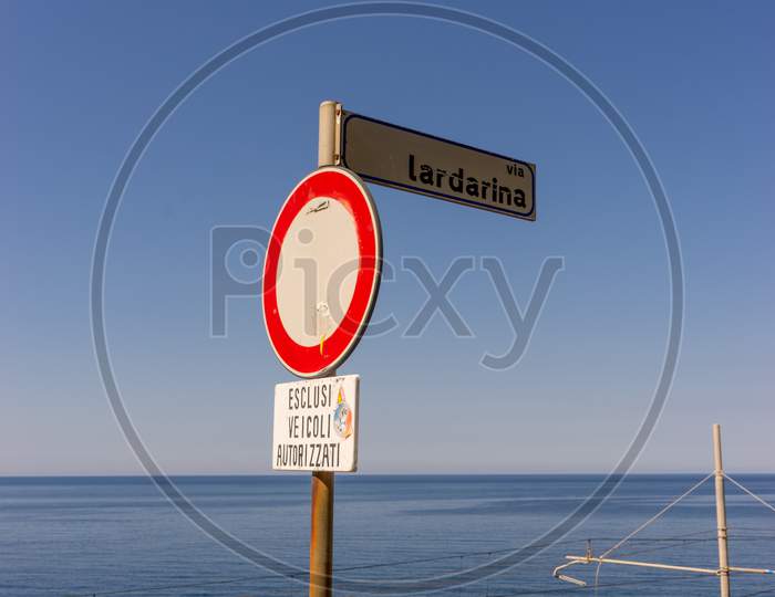 Italy, Cinque Terre, Corniglia, A Sign On A Beach