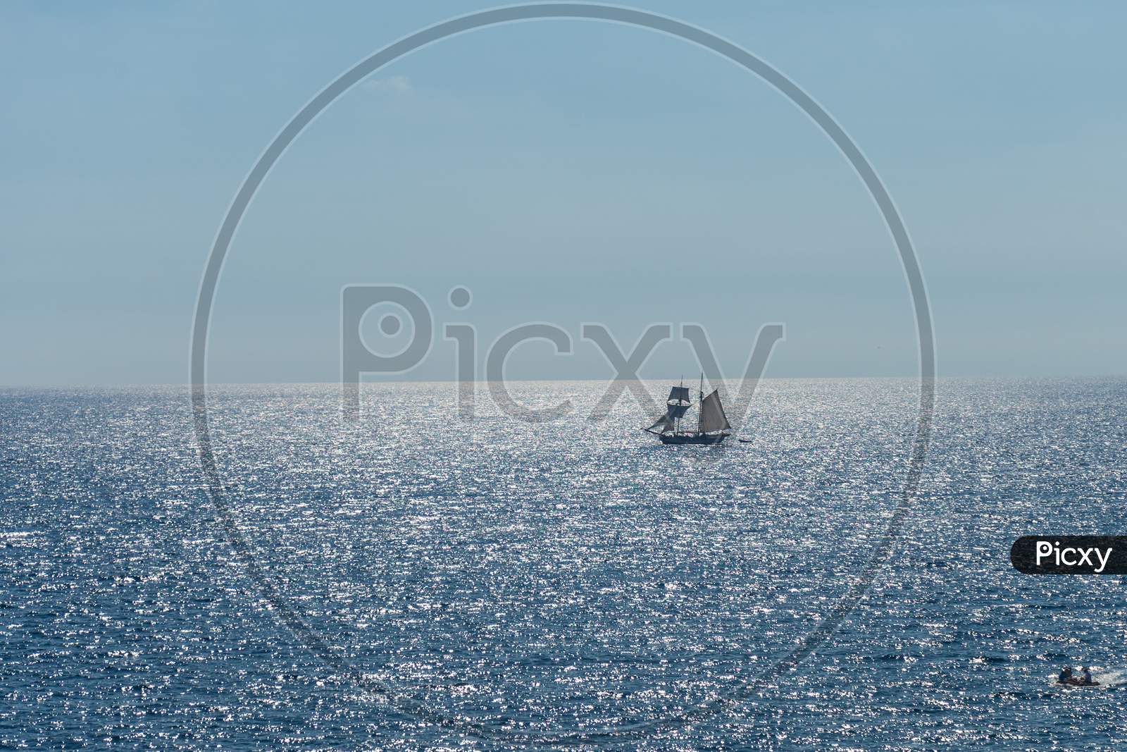 Italy, Cinque Terre, Manarola, A Large Boat In The Ocean