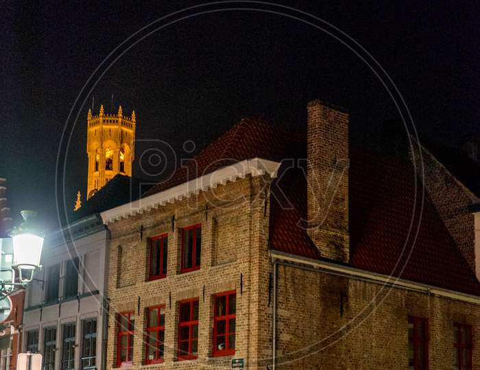 Bruges, Belgium - 17 February 2018: Narrow City Street At Night At Brugge, Bruges, Belgium