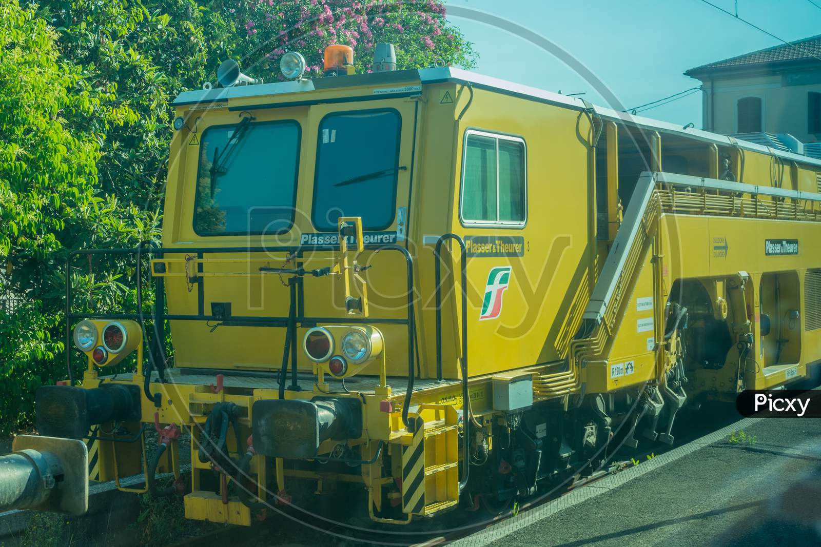 Italy - 28 June 2018: The Plasser And Theurer On Trenitalia In The Italian Outskirts Track
