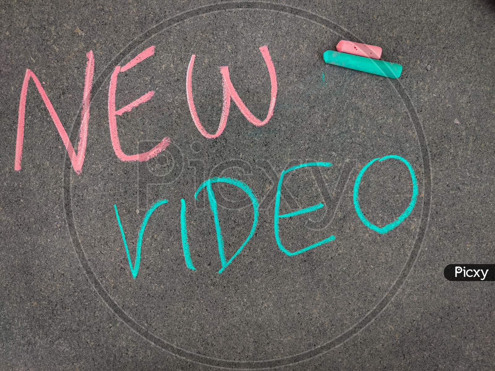The Inscription Text On The Grey Board,New Video. Using Color Chalk Pieces.