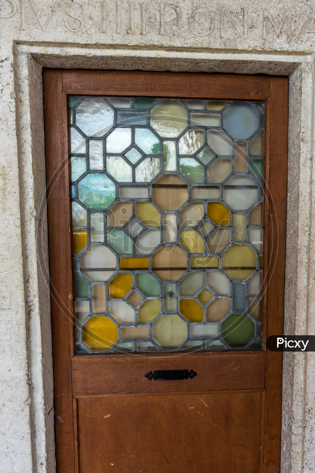 Door With A Glass Top With Colourful Patterns