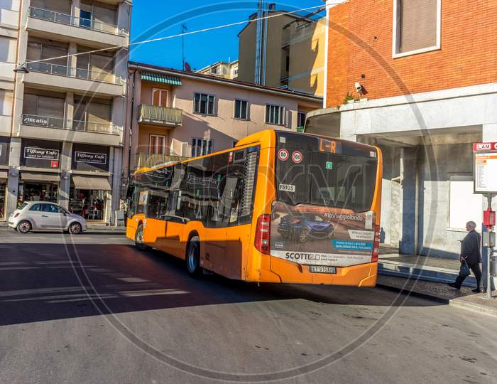 Pisa, Italy - 25 June 2018: Orange Local Transport Bus In Pisa, Italy