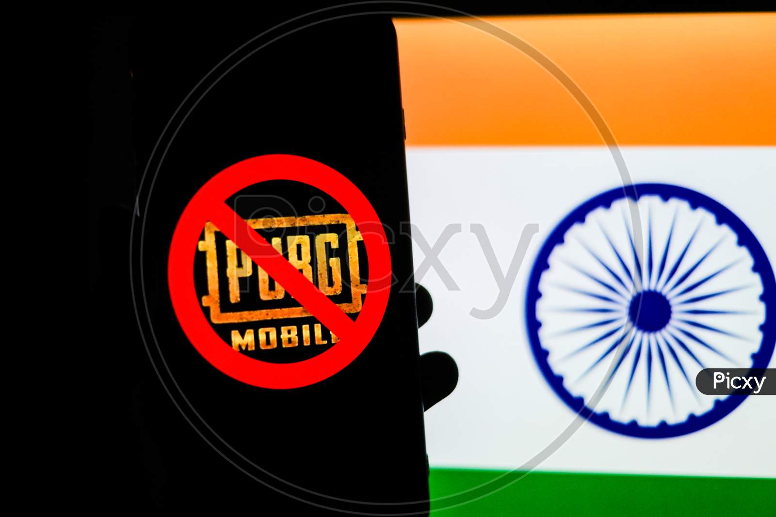 Banned PUBG or Playerunknown's Battlegrounds Game Logo on Smartphone Screen with Indian Flag in the Background