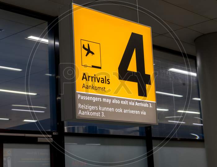 Netherlands, Amsterdam, Schiphol - 06 May, 2018:  Directions Inside The Airport Being Diaplayed For Passengers