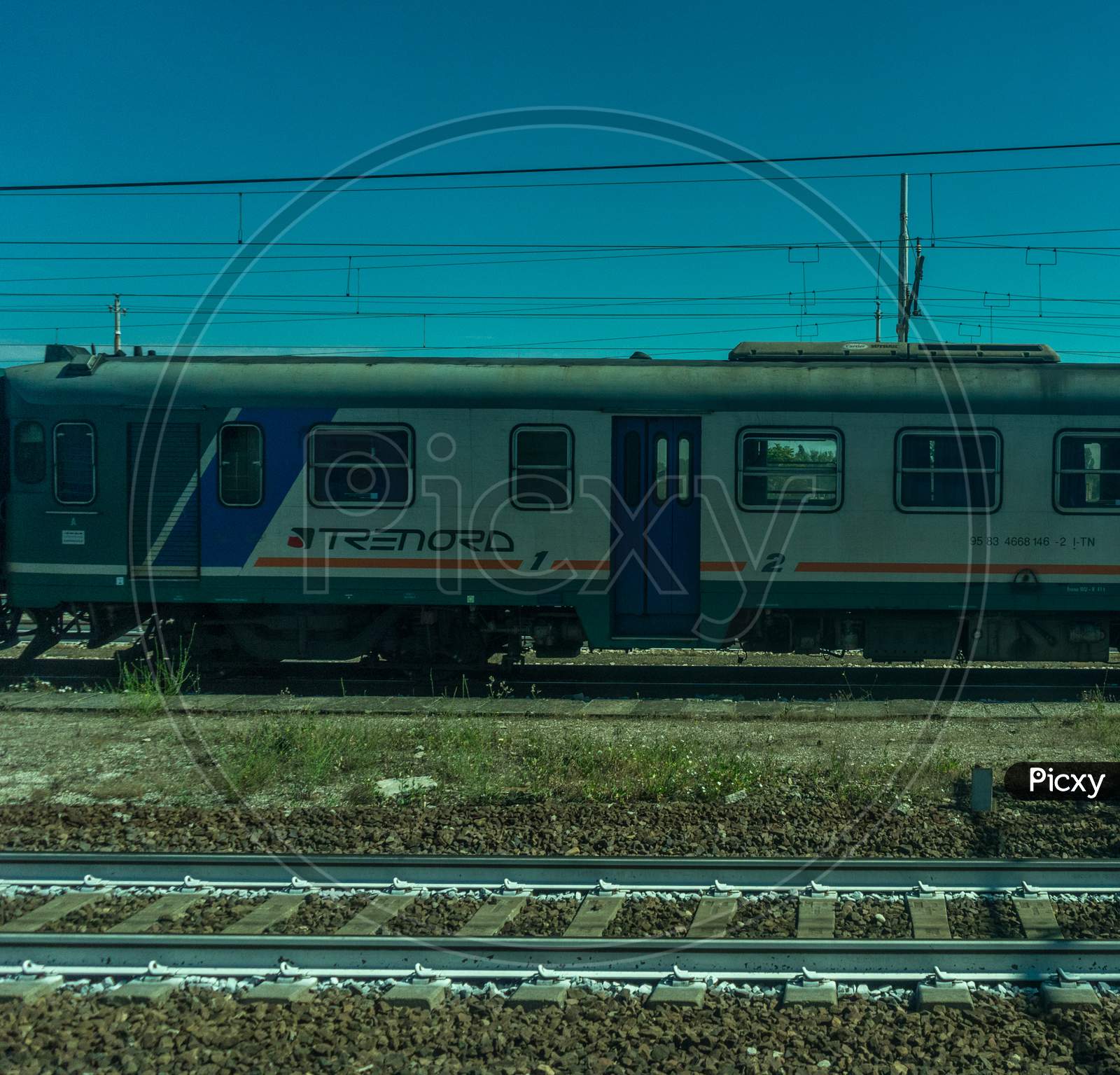 Italy - 28 June 2018: The Trenitalia Trenord In The Italian Outskirts Track