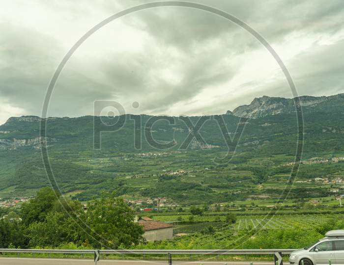 Italy - 28 June 2018: Family Car On Road Highway In The Italian Outskirts For A Holiday
