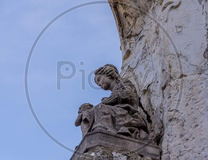 Belgium, Bruges, A Close Up Of A Rock Sculpture Of Madonna And Baby Jesus