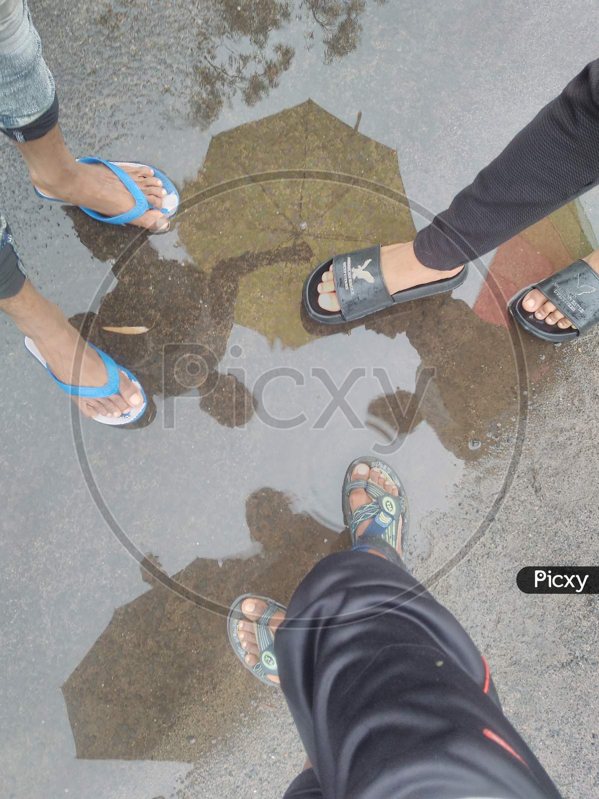 Monsoon with friends , water reflection