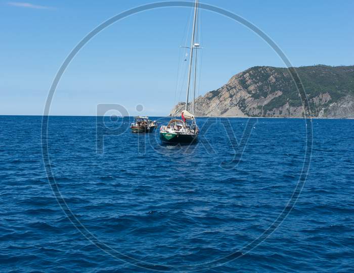 Riomaggiore, Cinque Terre, Italy - 26 June 2018: Boats And Yachts On The Ocean, Italian Riviera Of Riomaggiore, Cinque Terre, Italy