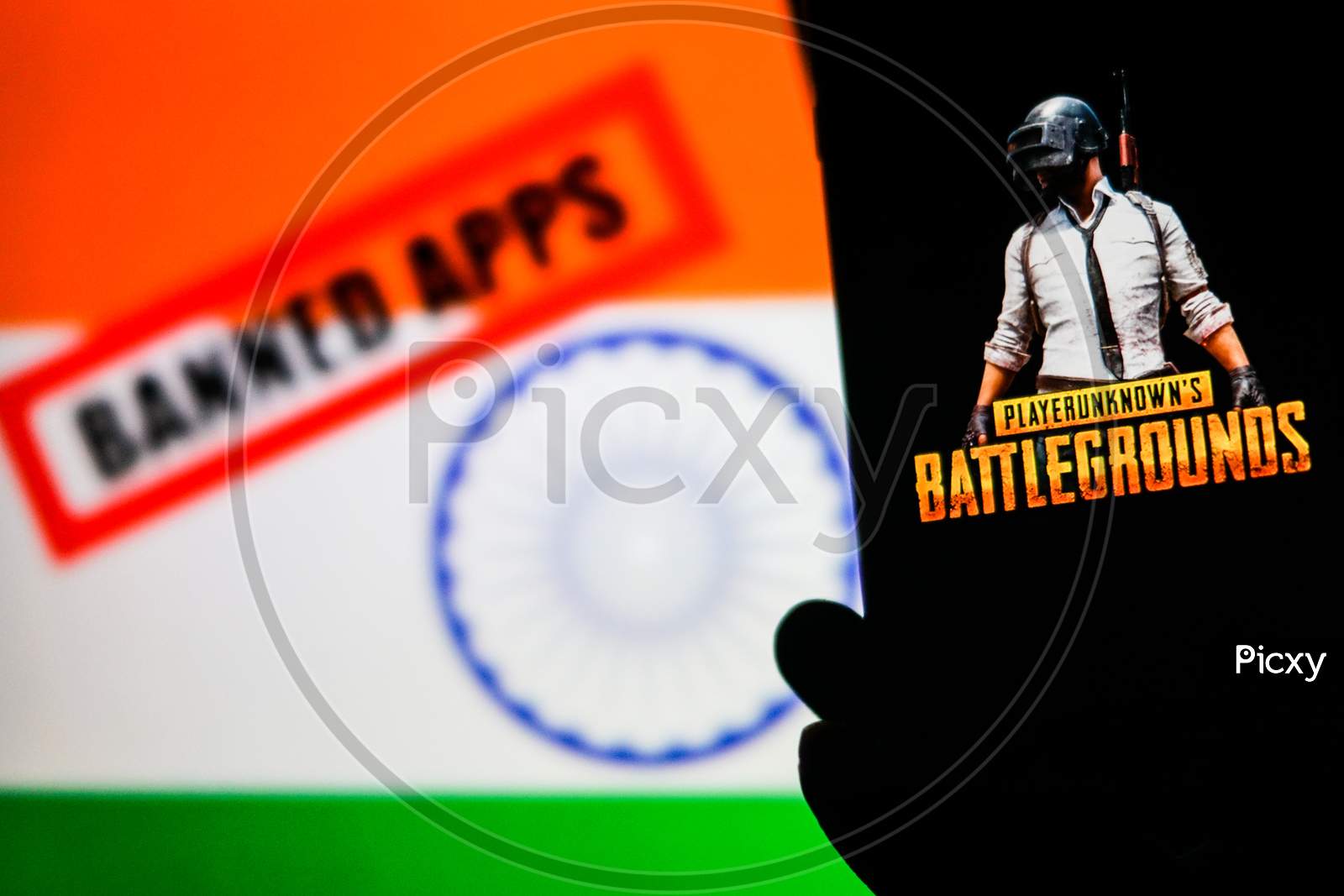 Banned PUBG or Playerunknown's BattlegroundsGame Logo on Smartphone Screen with Indian Flag in the Background