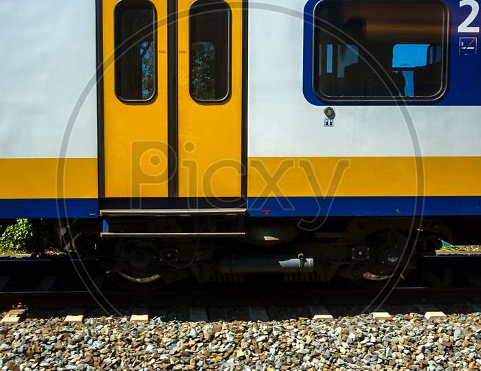 Netherlands, South Holland, Close-Up Of Yellow Train Carriage