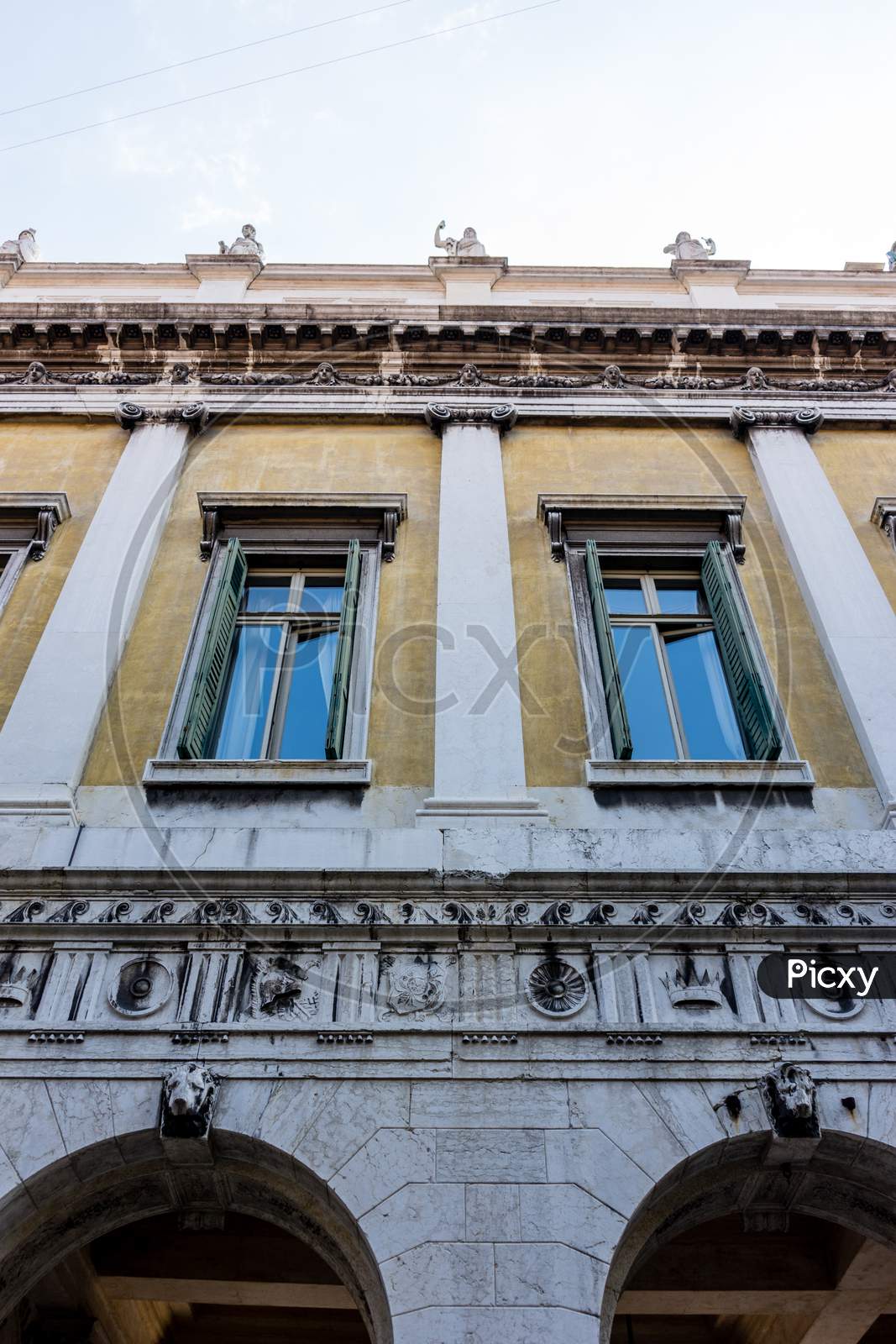 Italy, Venice, A Large Clock On The Side Of A Building