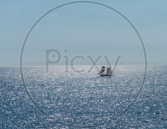 Italy, Cinque Terre, Manarola, A Large Boat In The Ocean