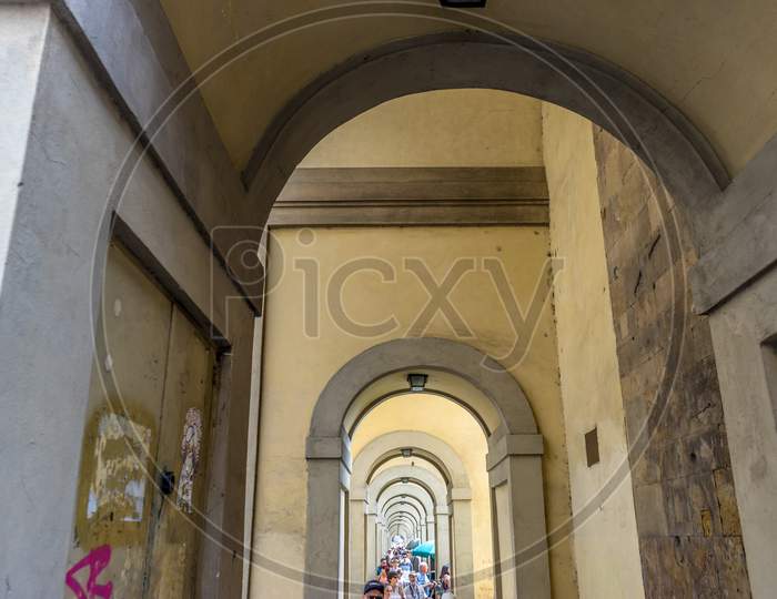 Florence, Italy - 25 June 2018: The Vasari Corridor Near Ponte Vecchio Over The Arno River In Florence, Italy
