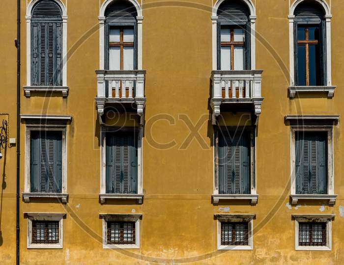 Italy, Venice, A Clock On The Side Of A Building