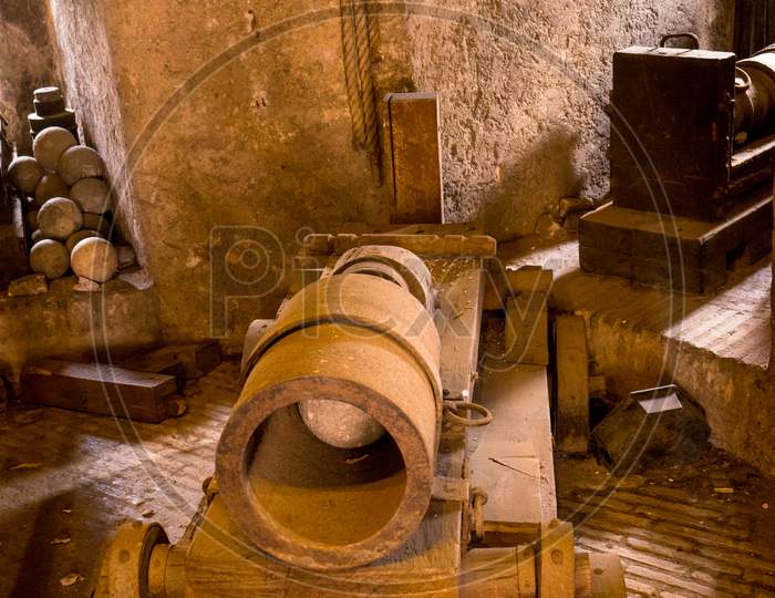Rome, Italy - 23 June 2018: Ancient Catapult Cannon Weapon With Cannon Balls At The Castel Sant Angelo, Mausoleum Of Hadrian In Rome, Italy