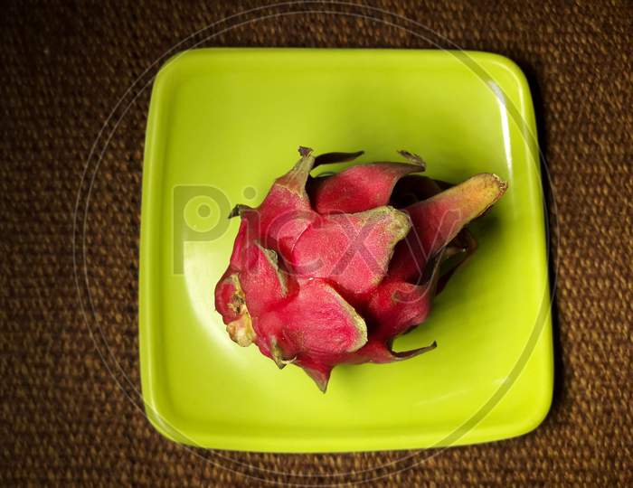 Dragon fruit ,fleshy vibrant red in colour full of vitamins and minerals .