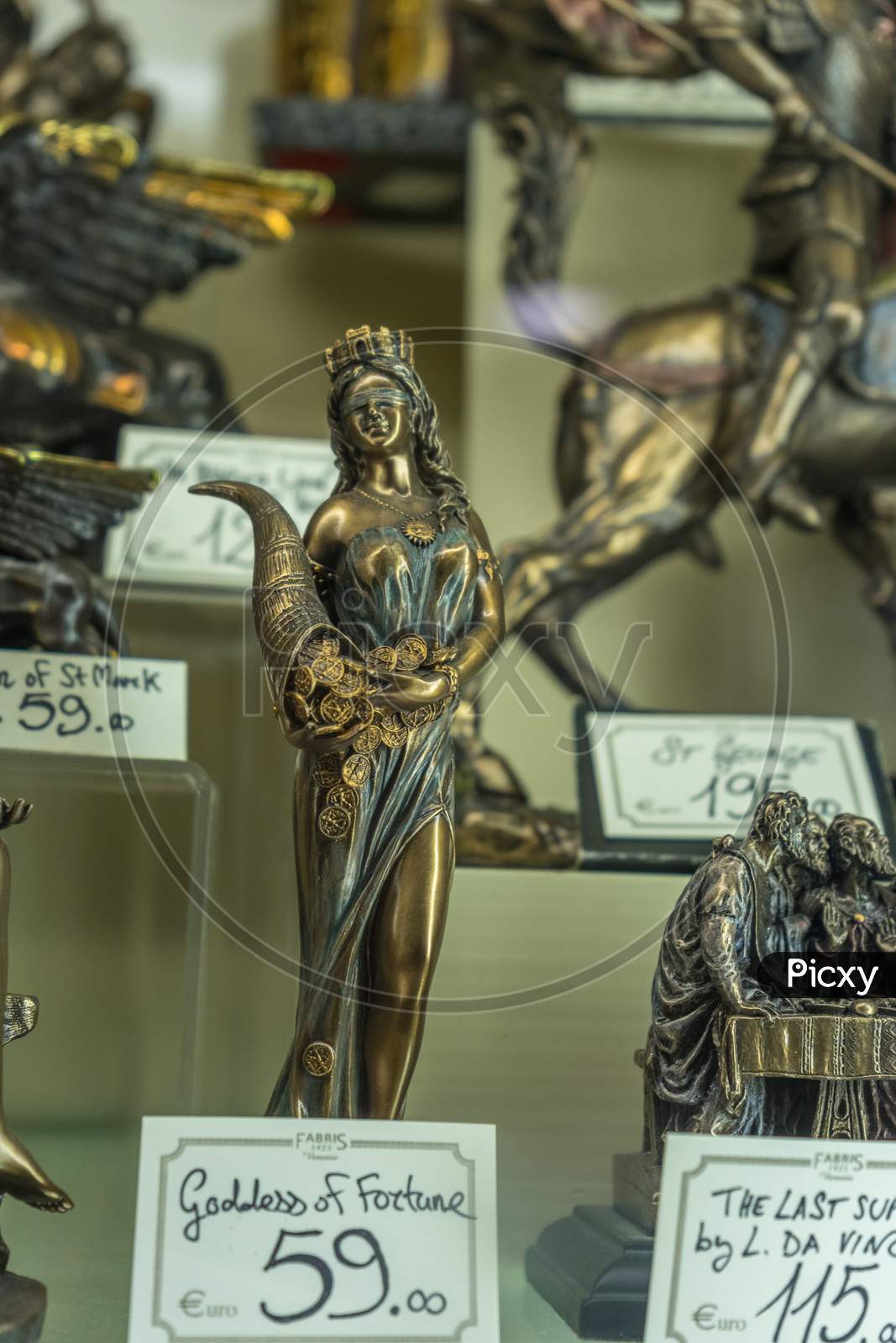 Venice, Italy - 30 June 2018: Fortune Goddess Artifacts On Display In A Shop In Venice, Italy