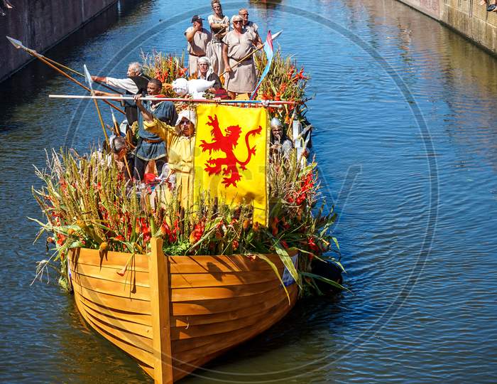 Netherlands,Delft-5 August 2018:Westland Boat Parade (Varend Corso),Festive Spectacle,Boats Decorated With Flowers And Vegetables, Colorful Sailing Flower Parade In The Westland Region
